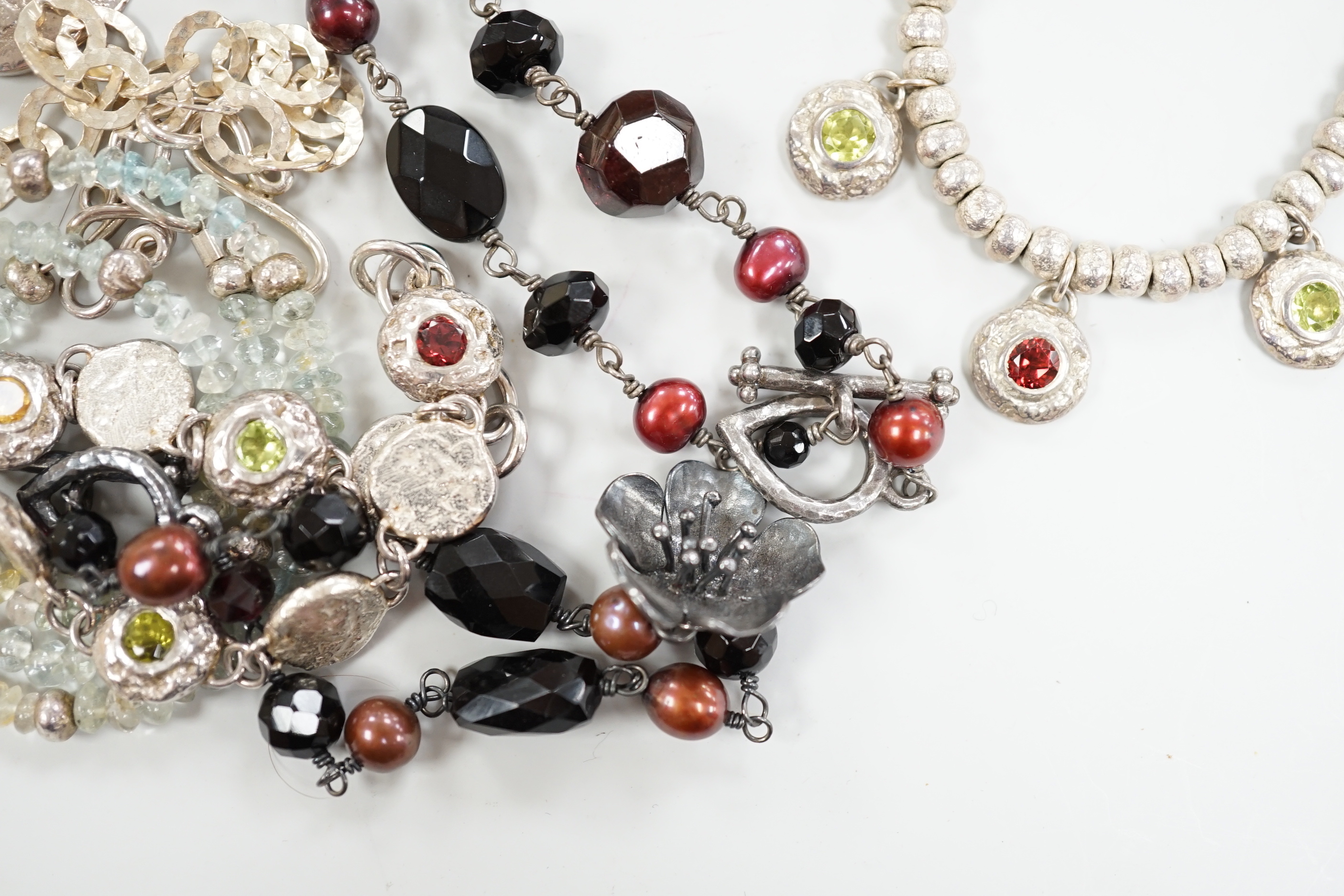 Two Pruden Smith silver necklaces and a similar bracelet, three other assorted silver necklaces and two silver bracelets, some with beads, largest 50cm.